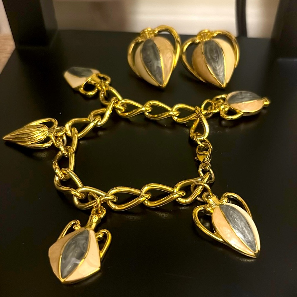 Vintage Trifari bracelet and earring set wine jugs or perfume bottles?
